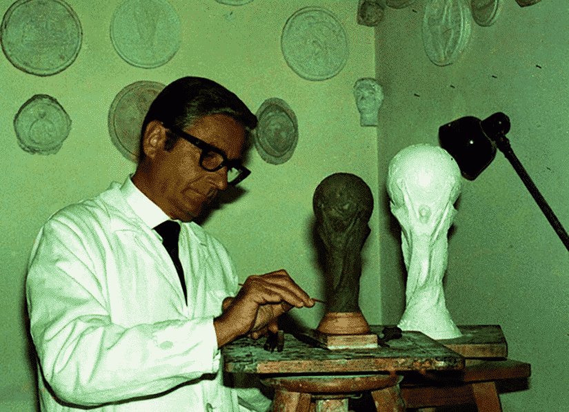 Scultop Silvio Gazzaniga working on his World Cup Trophy, 1971