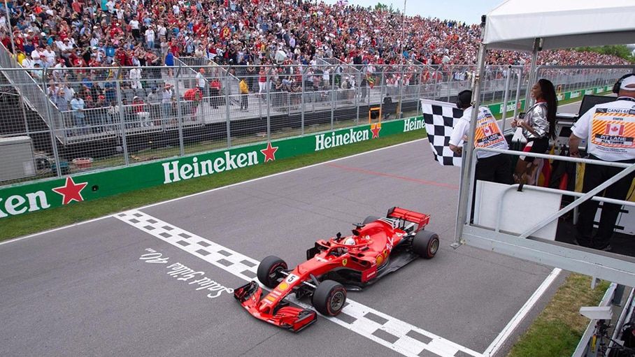 Sebastian Vettel finish line first postiion Cnadian Grand Prix