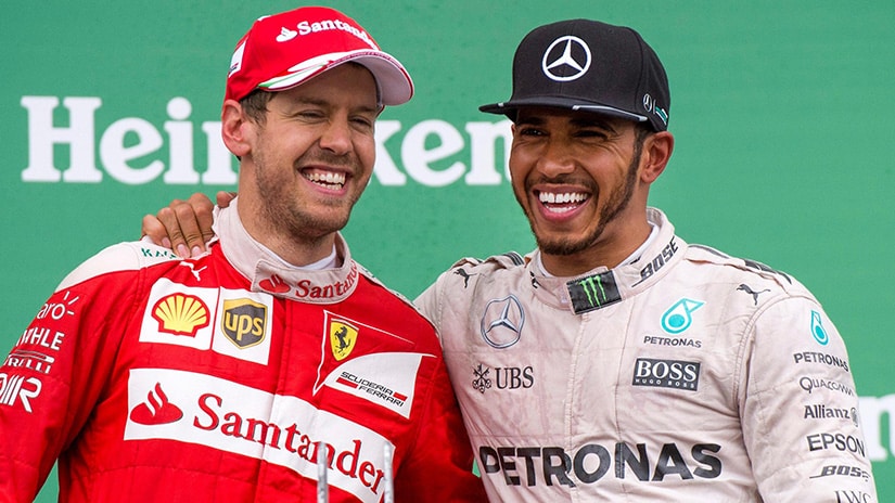 Vettel Ferrari left and Hamilton Mercedes AMG right
