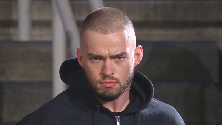 WWE masked man reveals himself